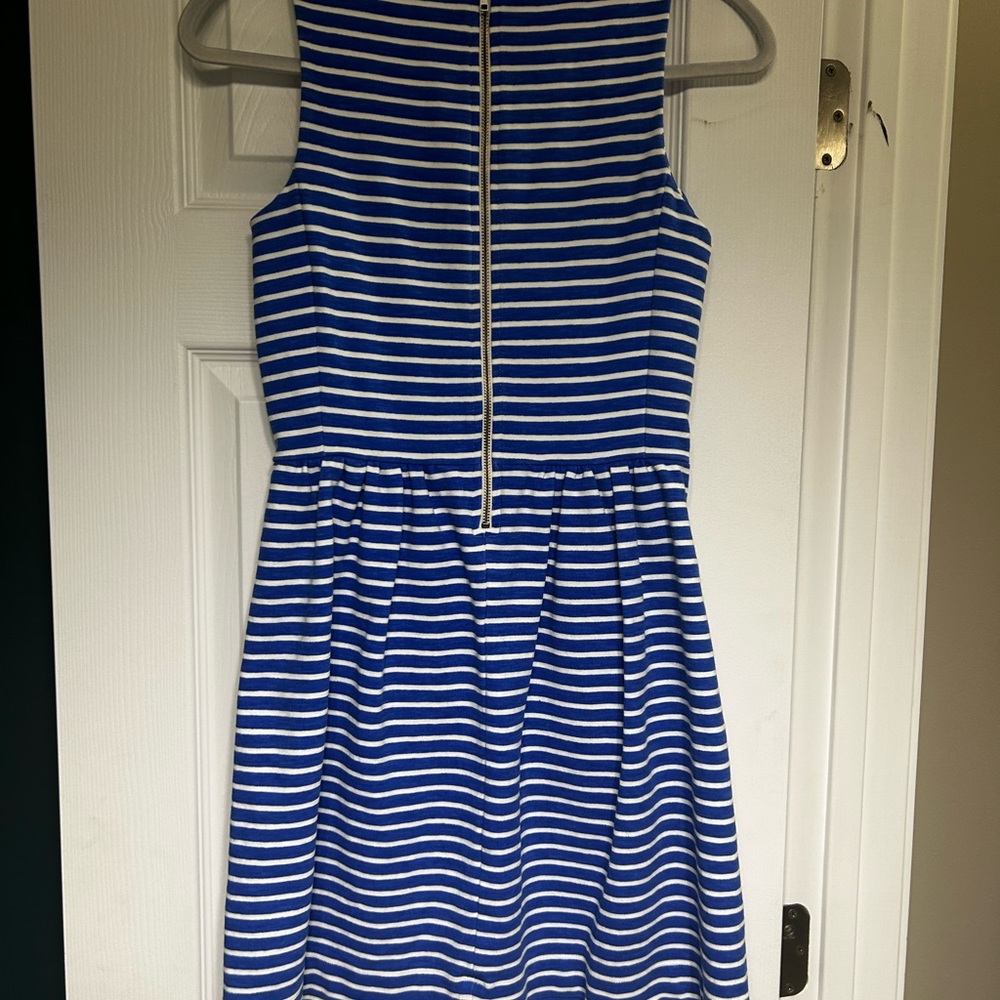 A striped dress with pockets. It is used but In good condition